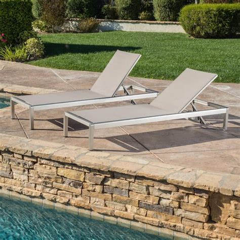 noble house cape coral silver 2-piece metal outdoor chaise lounge|Noble House Cape Coral Outdoor Chaise Lounge in Silver.